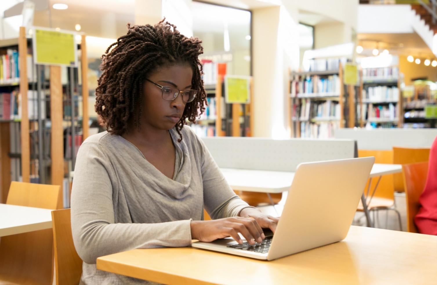 Professional presenting financial data to engaged business team