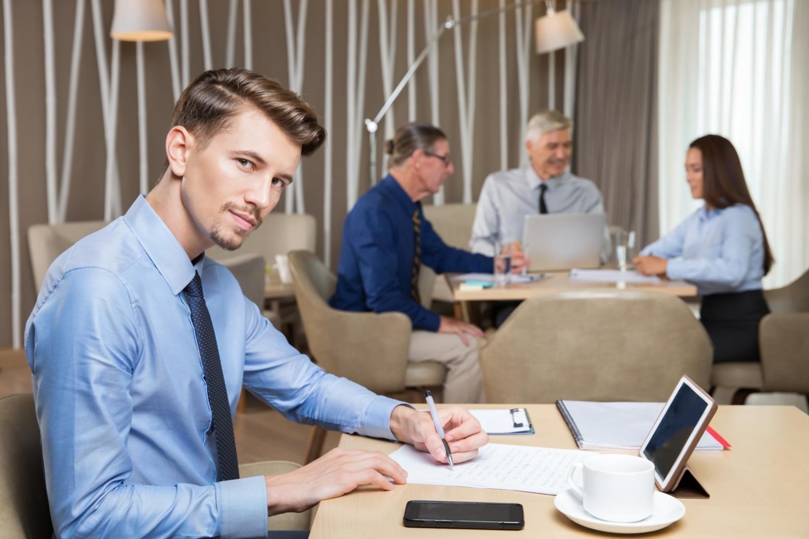 Professional meeting discussing financial communication strategies