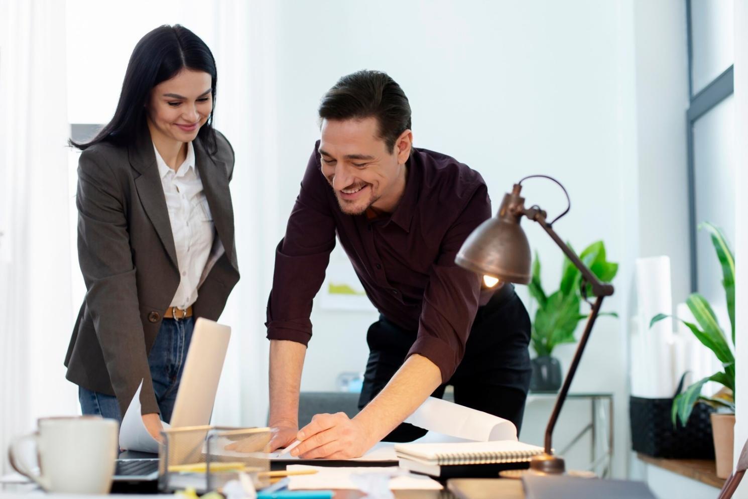 Professional financial planning session with documents and charts